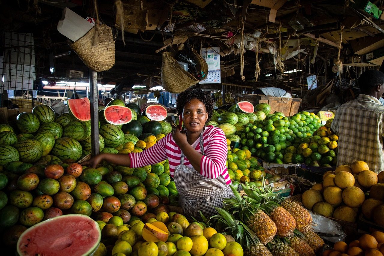 Kenya Economy - woman selling fruits