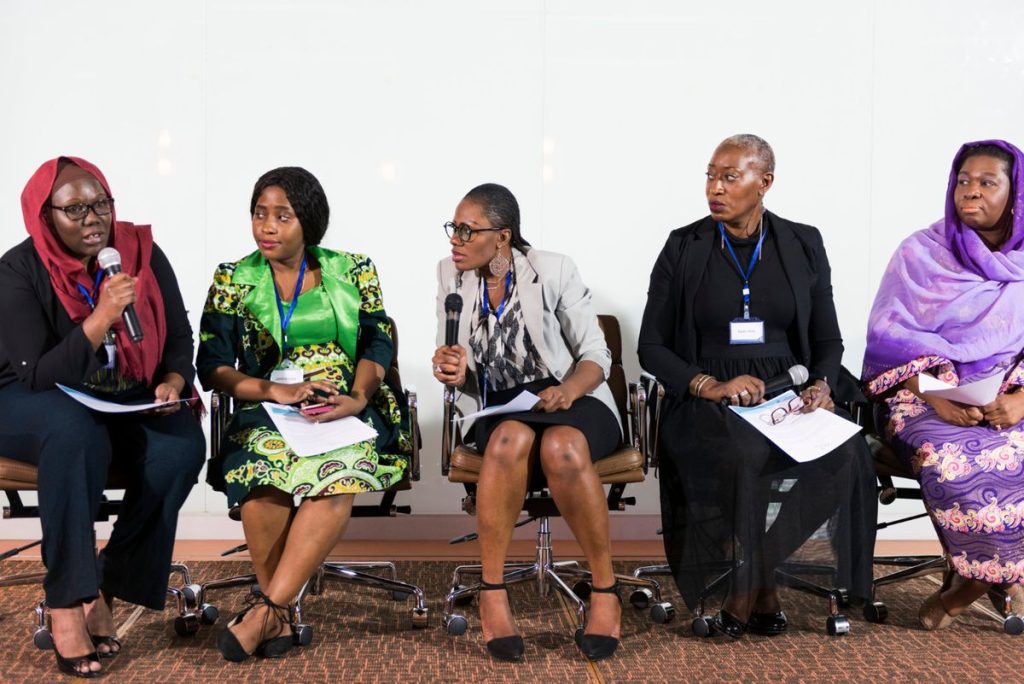 African women participating in a panel discussion