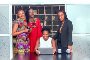 Professional African women collaborating on project